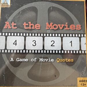 At the Movies: A Game of Movie Quotes (Black)